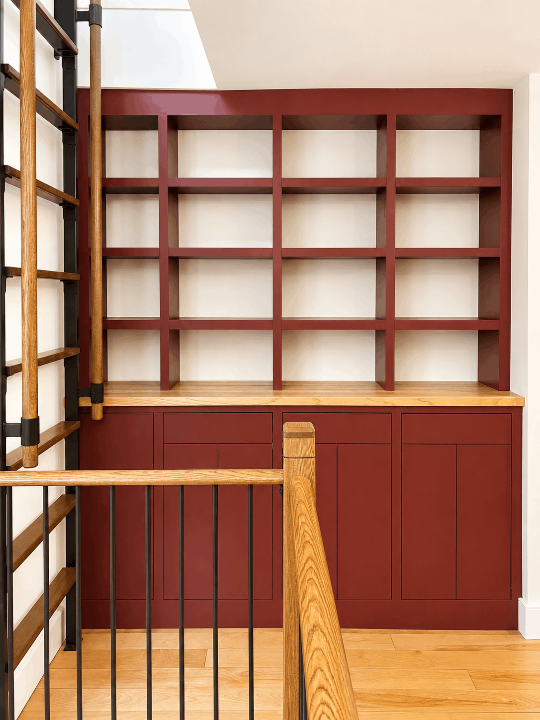 Custom walk-in closet with real wood shelving built by Lake Champlain Closets